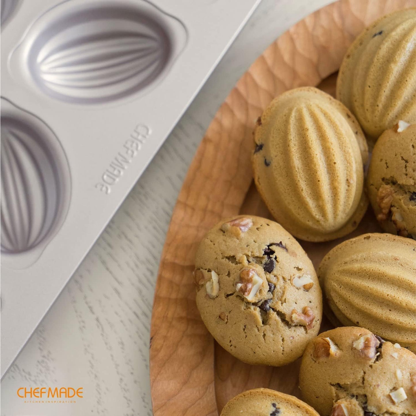 CHEFMADE Muffin Cake Pan, 12-Cavity Non-Stick Rugby-Shaped Bakeware for Oven Baking (Champagne Gold)